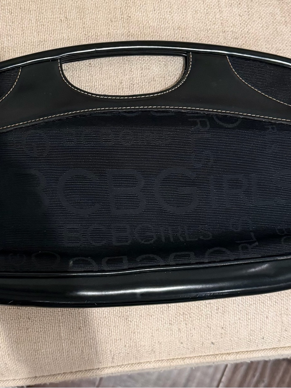 BCBGirls Black Logo Wristlet Clutch with Cutout Handle